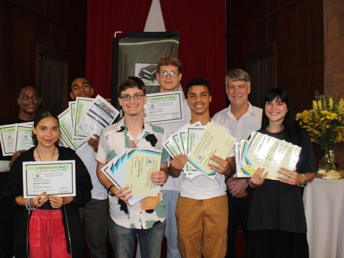 Learners at a False Bay High School prize-giving with their certificates